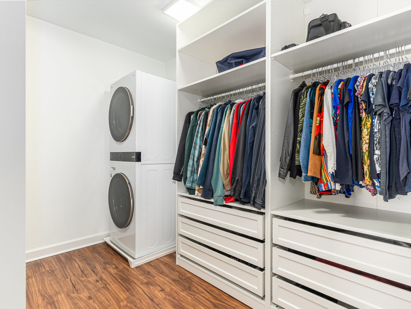 23024 Pilcher Road Plainfield, IL 60544 - Photo 14 of 56 a view of walk in closet with clothes and shoes