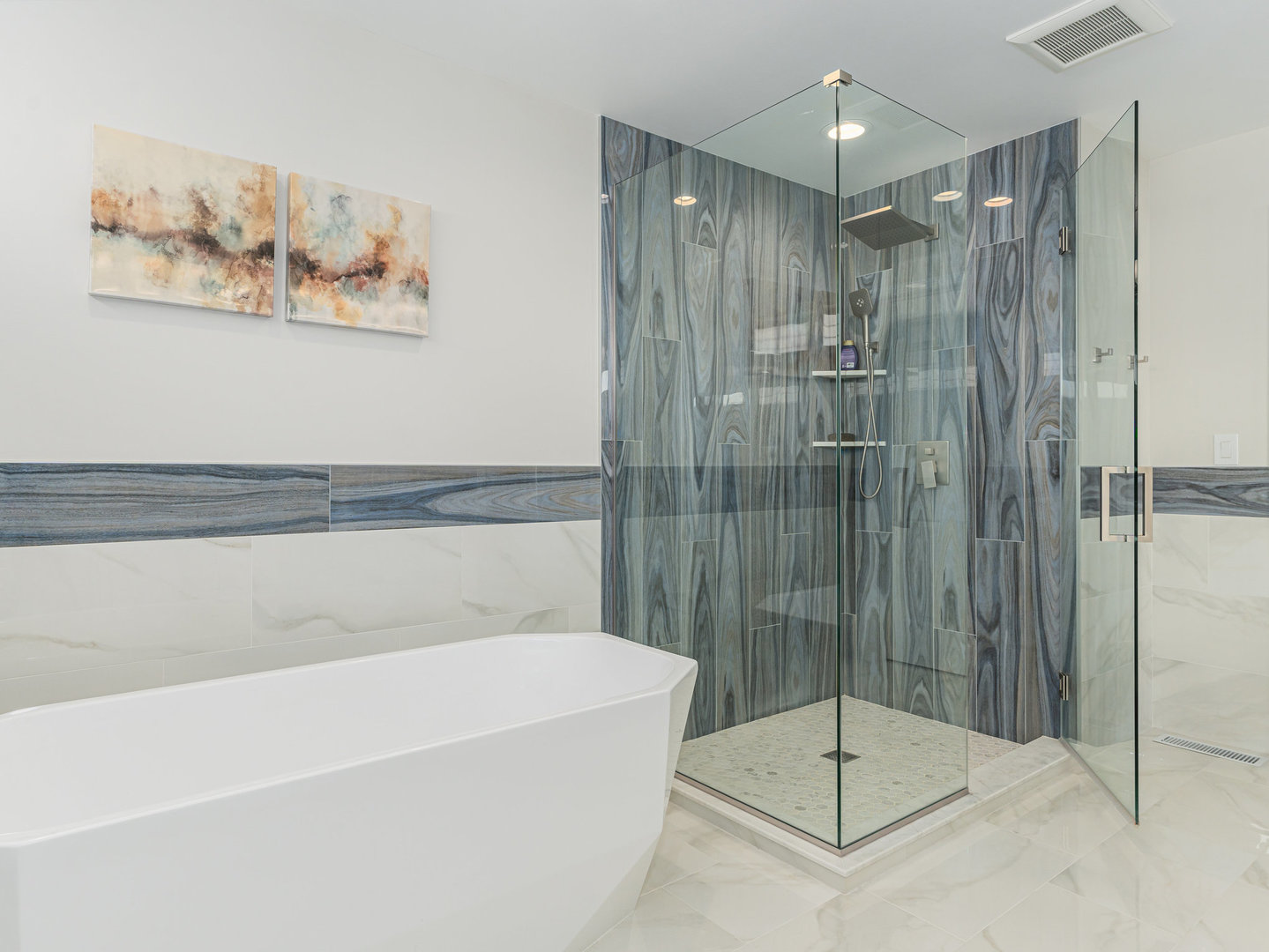 23024 Pilcher Road Plainfield, IL 60544 - Photo 15 of 56 a bathroom with a shower and a bath tub