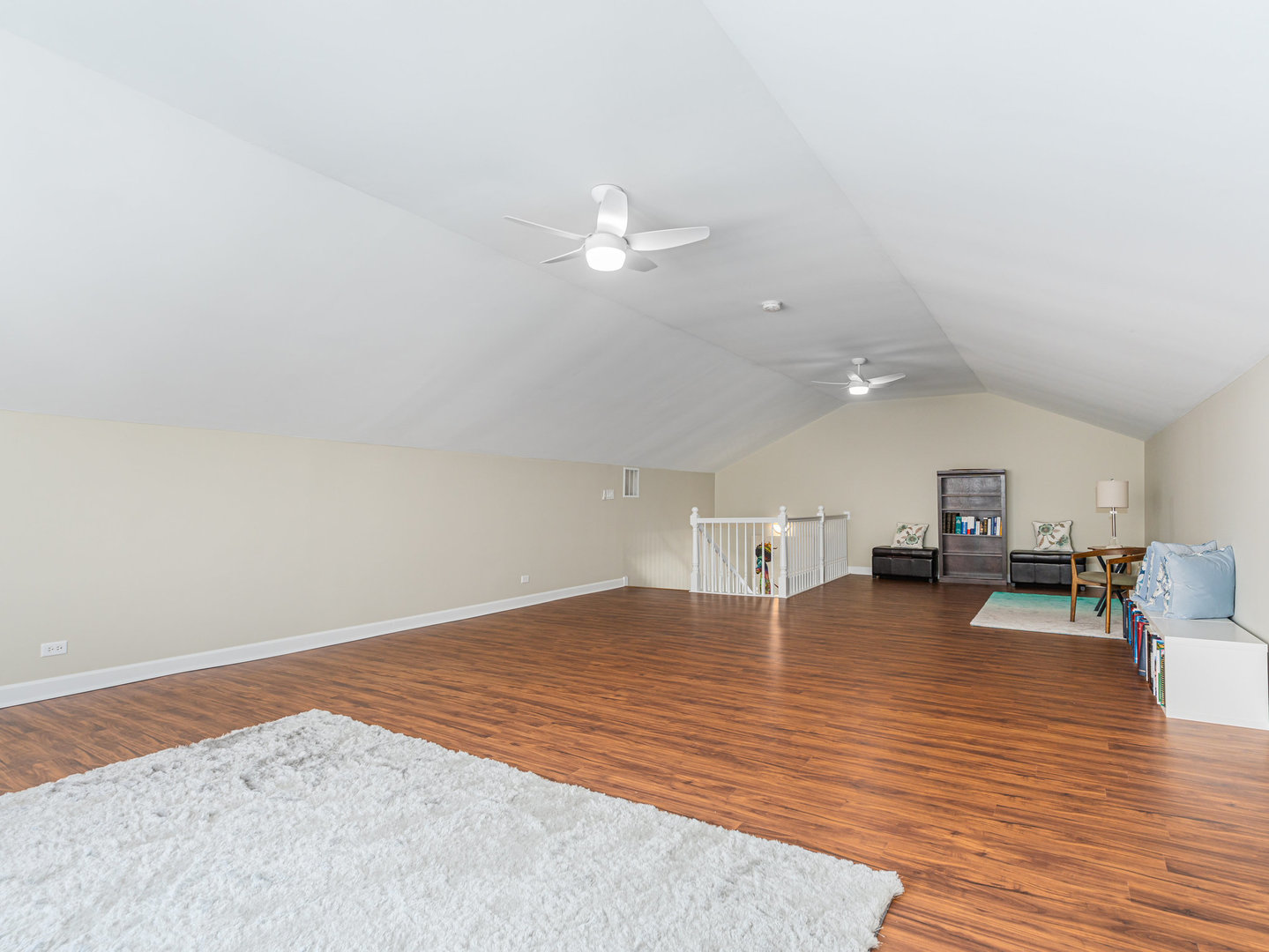 23024 Pilcher Road Plainfield, IL 60544 - Photo 37 of 56 a view of empty room with wooden floor and ceiling fan