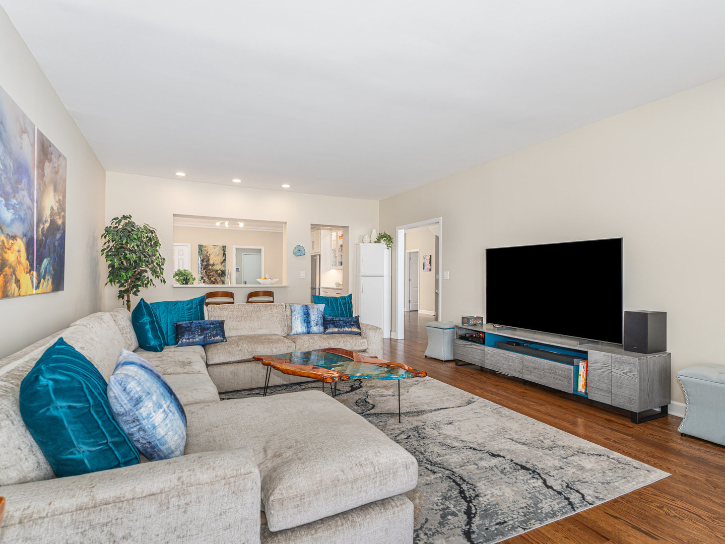 23024 Pilcher Road Plainfield, IL 60544 - Photo 47 of 56 a living room with furniture and a flat screen tv