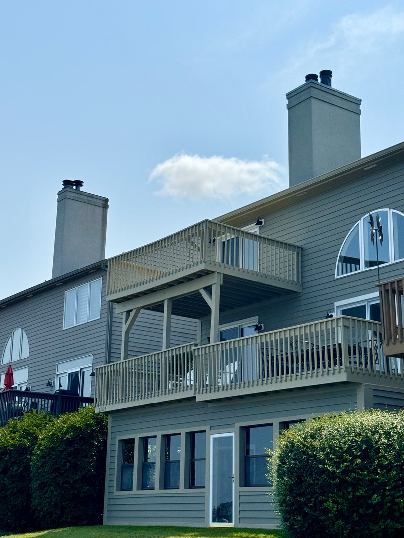 23024 Pilcher Road Plainfield, IL 60544 - Photo 54 of 56 a view of a house with a deck