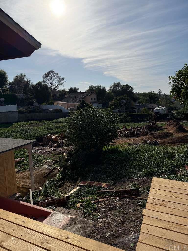 3536 Ybarra Road Spring Valley, CA 91978 - Photo 13 of 42 a view of a yard and front view of a house