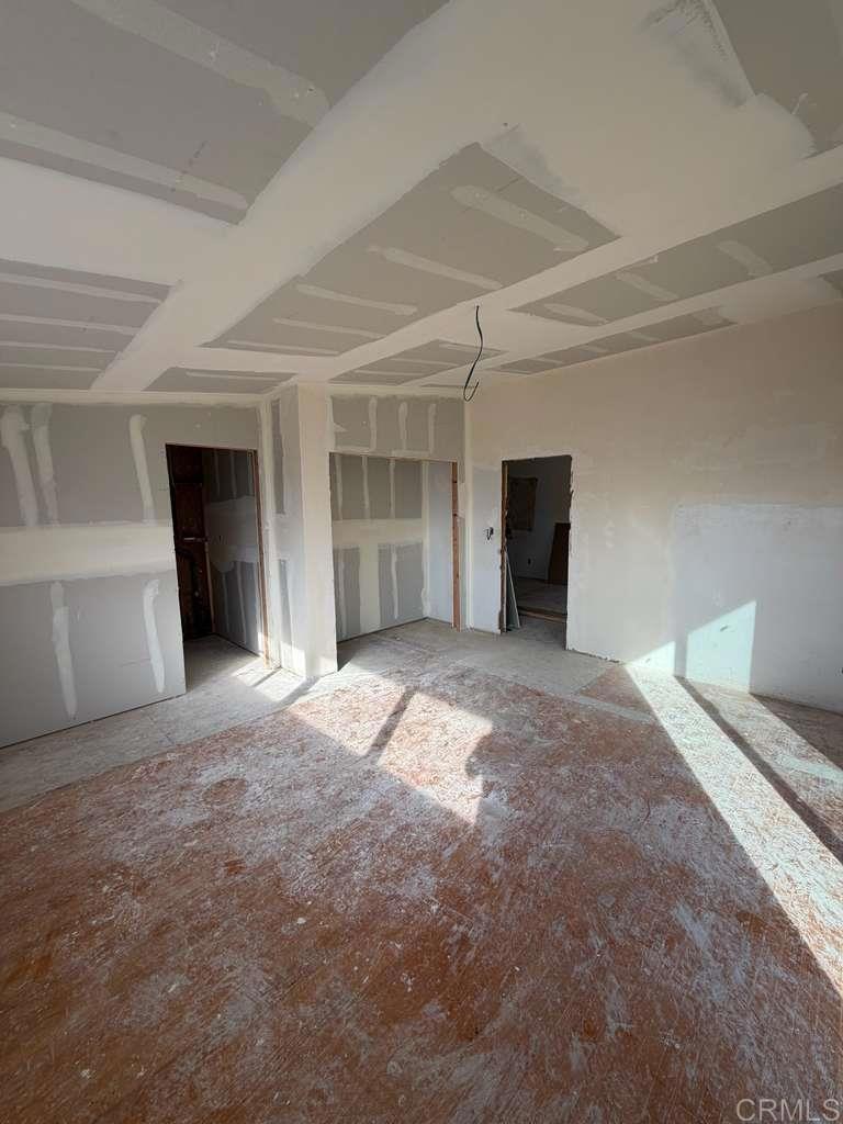 3536 Ybarra Road Spring Valley, CA 91978 - Photo 19 of 42 a view of a big room with closet and windows