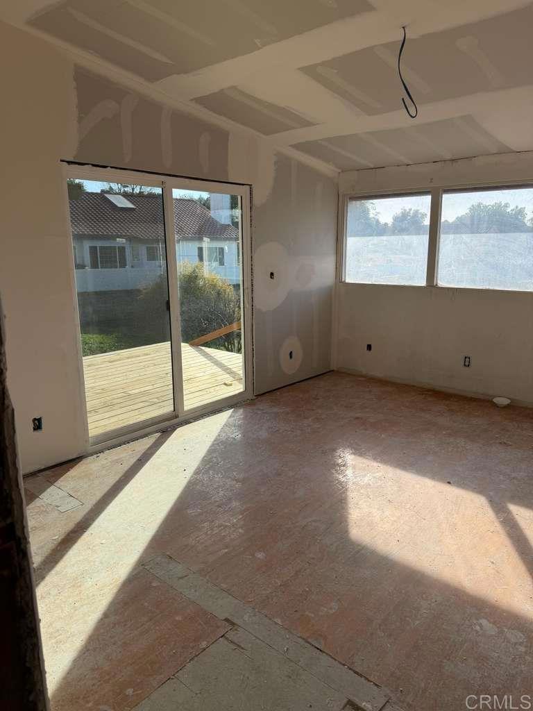 3536 Ybarra Road Spring Valley, CA 91978 - Photo 22 of 42 a view of an empty room with a window