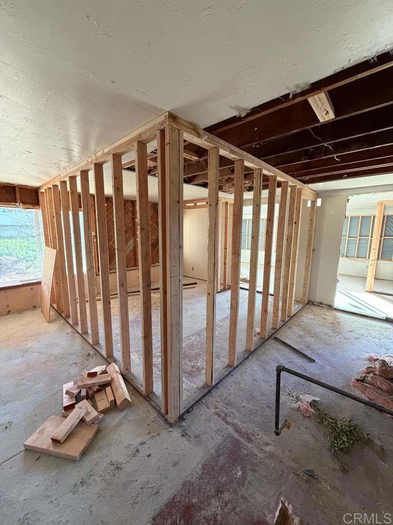 3536 Ybarra Road Spring Valley, CA 91978 - Photo 37 of 42 a view of a room with wooden floor and stairs