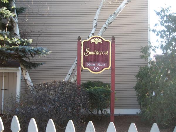 a sign that is on a wooden wall