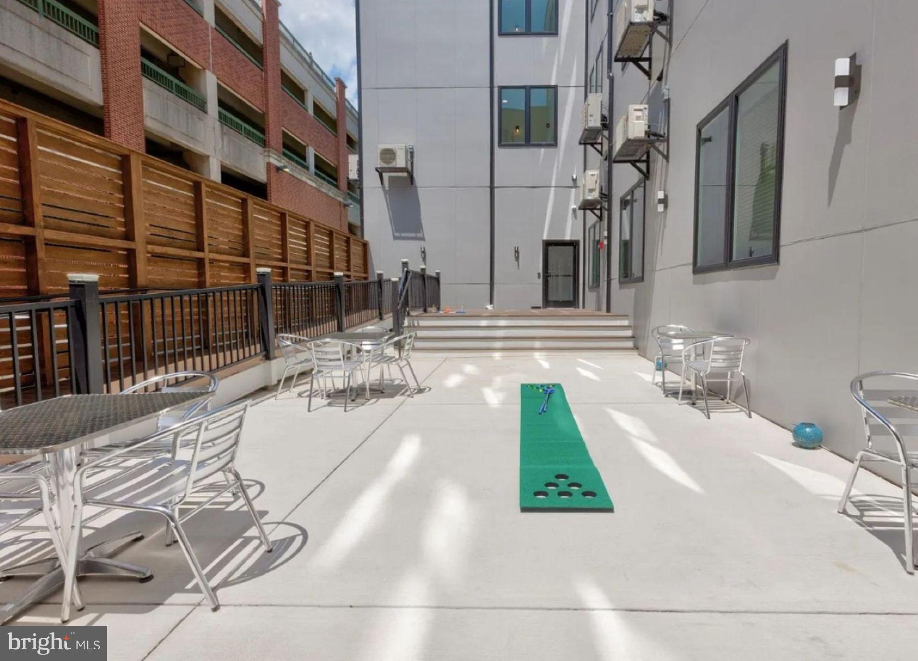 520 South Caroline Street, Unit 405 Baltimore, MD 21231 - Photo 15 of 18 a view of a house with a swimming pool