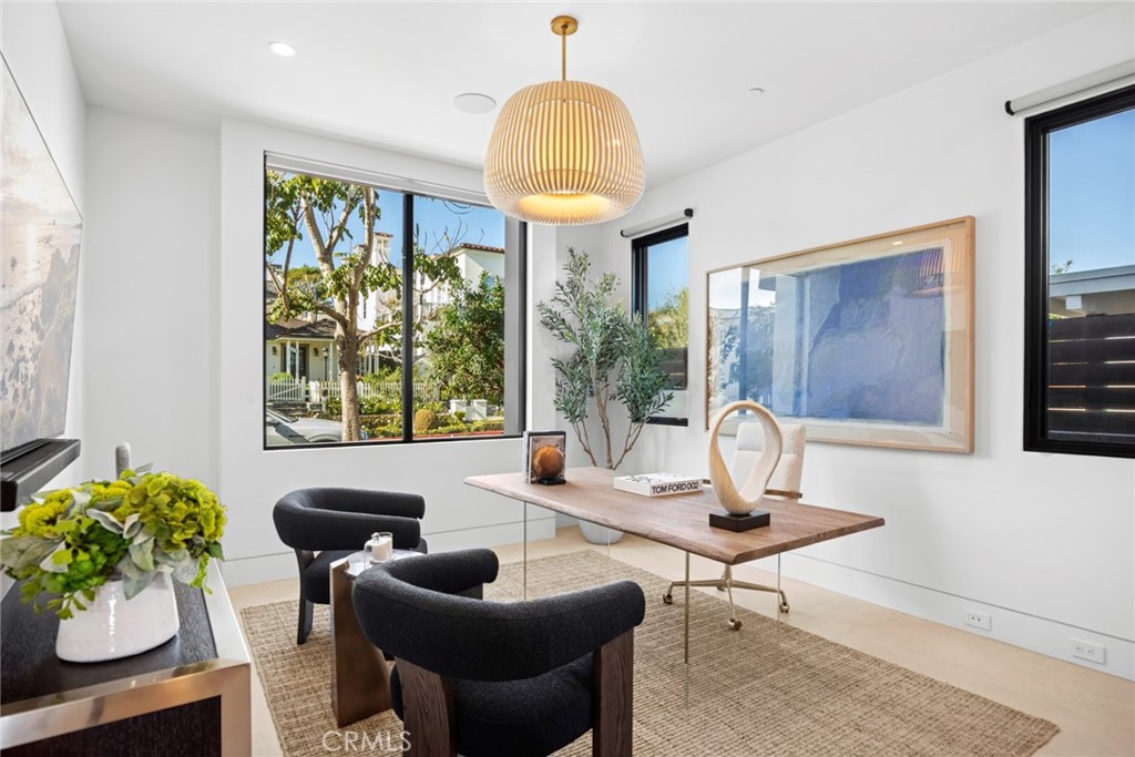 304 Poppy Avenue Corona del Mar, CA 92625 - Photo 15 of 35 a living room with furniture and a window