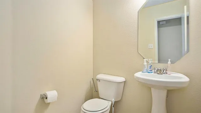 a bathroom with a sink and a toilet