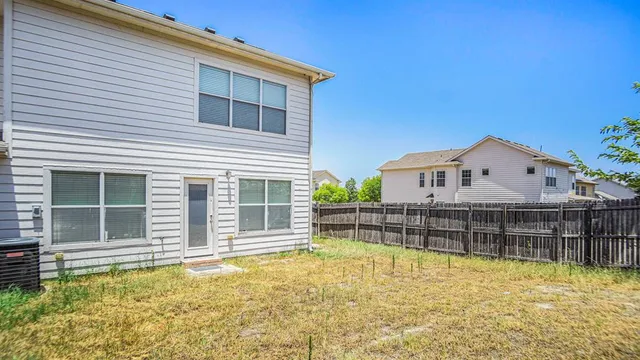 a view of a house with swimming pool