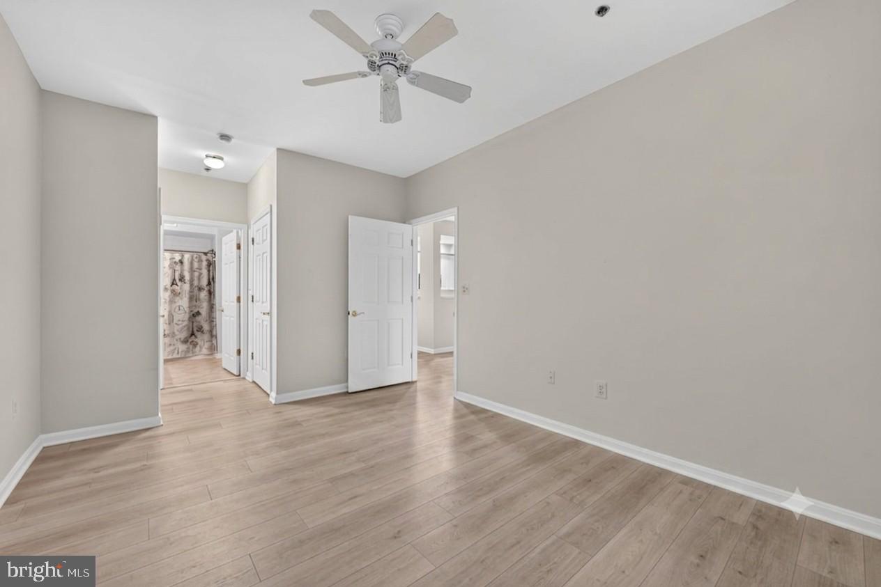 11775 Stratford House Place, Unit 112 Reston, VA 20190 - Photo 23 of 53 Primary Bedroom