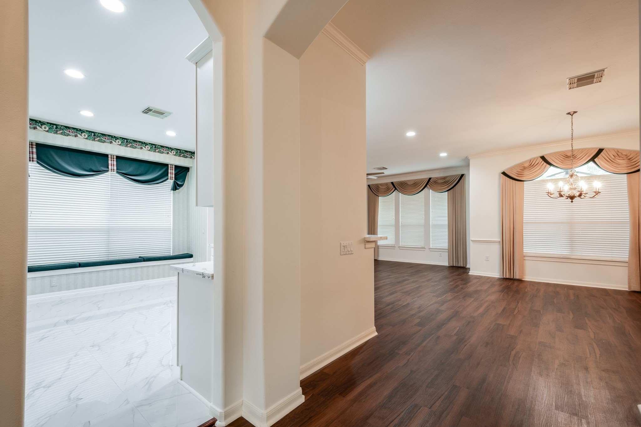 43 North Belfair Place Spring, TX 77382 - Photo 8 of 36 a view of a hallway with wooden floor and entryway