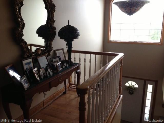7546 West Sherwood Road Fowlerville, MI 48836 - Photo 10 of 32 Two story foyer
