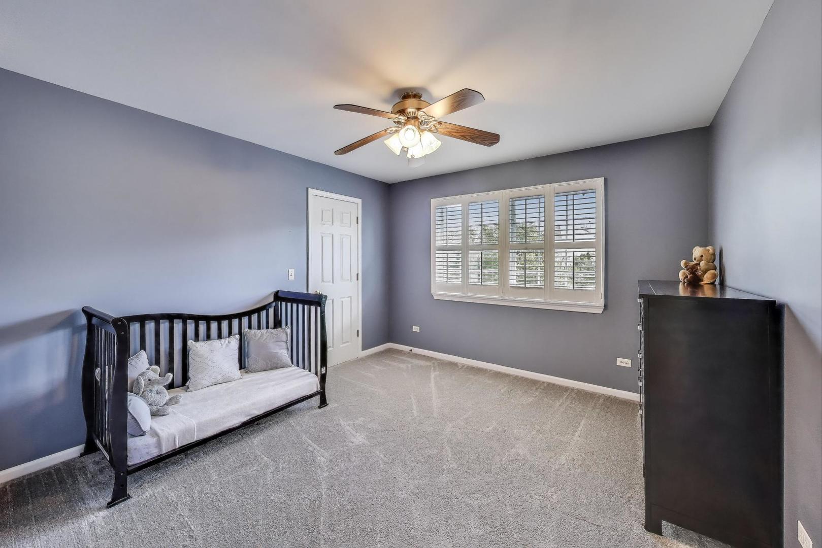 17119 West Prairieview Lane Gurnee, IL 60031 - Photo 22 of 40 a view of an empty room with a window