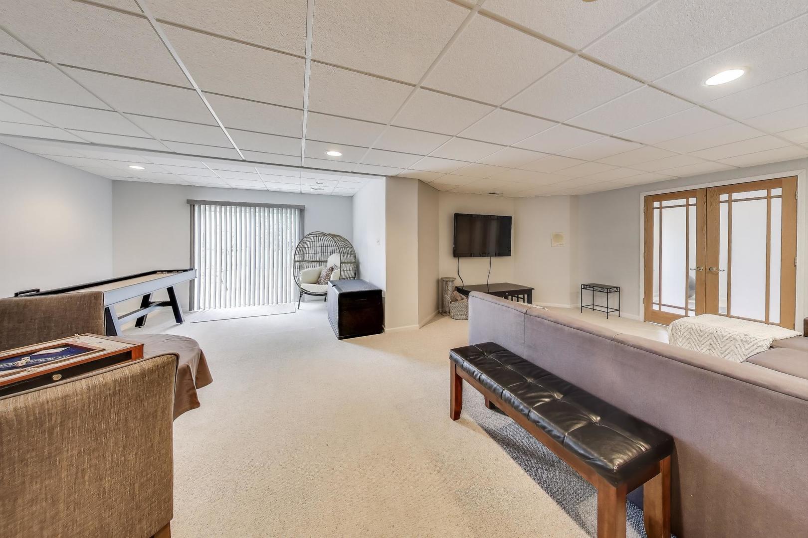 17119 West Prairieview Lane Gurnee, IL 60031 - Photo 26 of 40 a room with furniture pool table and windows