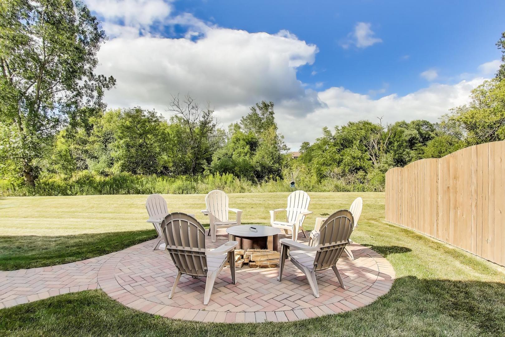 17119 West Prairieview Lane Gurnee, IL 60031 - Photo 35 of 40 a view of a chairs and table in the garden