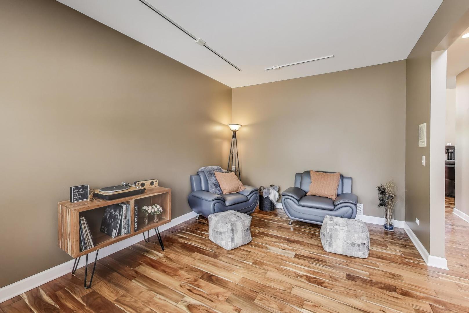 17119 West Prairieview Lane Gurnee, IL 60031 - Photo 4 of 40 a bedroom with furniture and a wooden floor