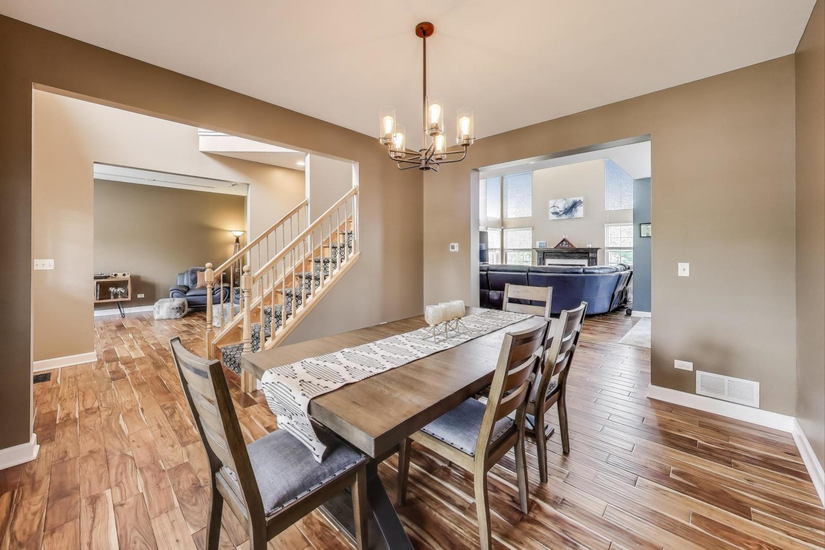 17119 West Prairieview Lane Gurnee, IL 60031 - Photo 6 of 40 a view of a dining room with furniture