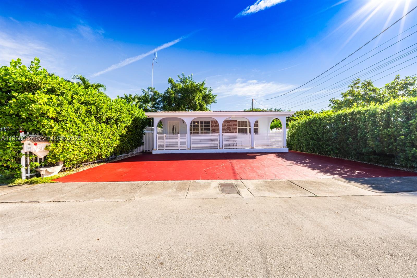 a view of swimming pool with a house in the background