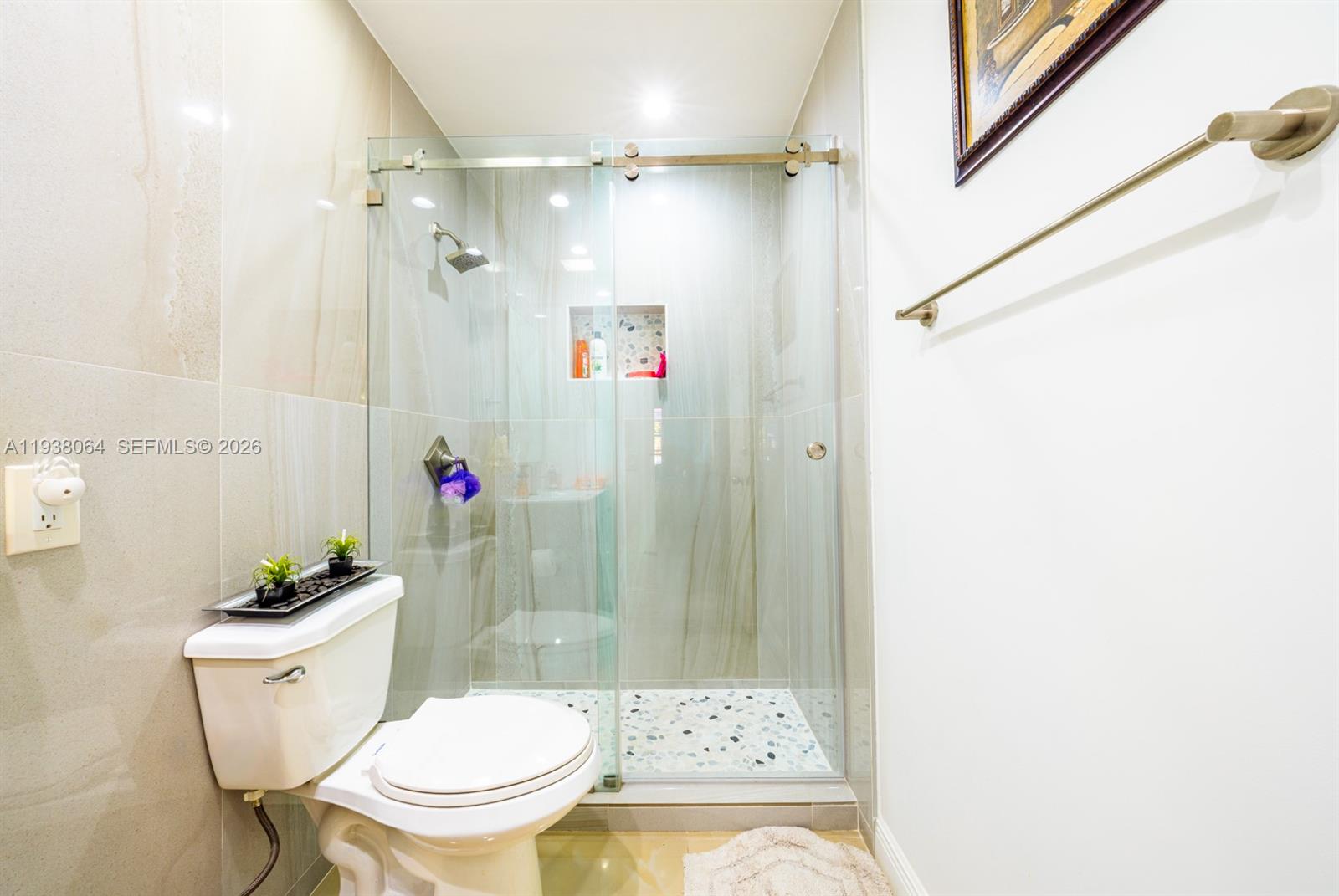 1937 Southwest 57th Court Miami, FL 33155 - Photo 12 of 23 a bathroom with a sink toilet and shower