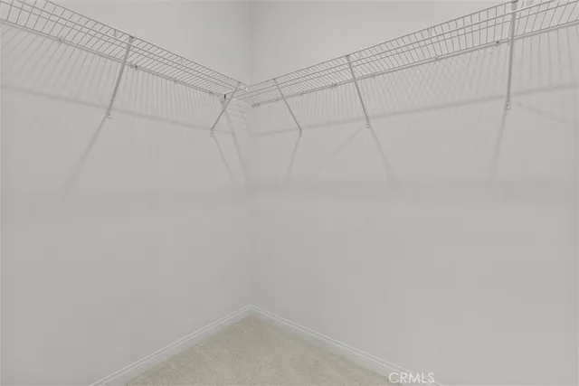 a bathroom with a double vanity sink mirror and shower