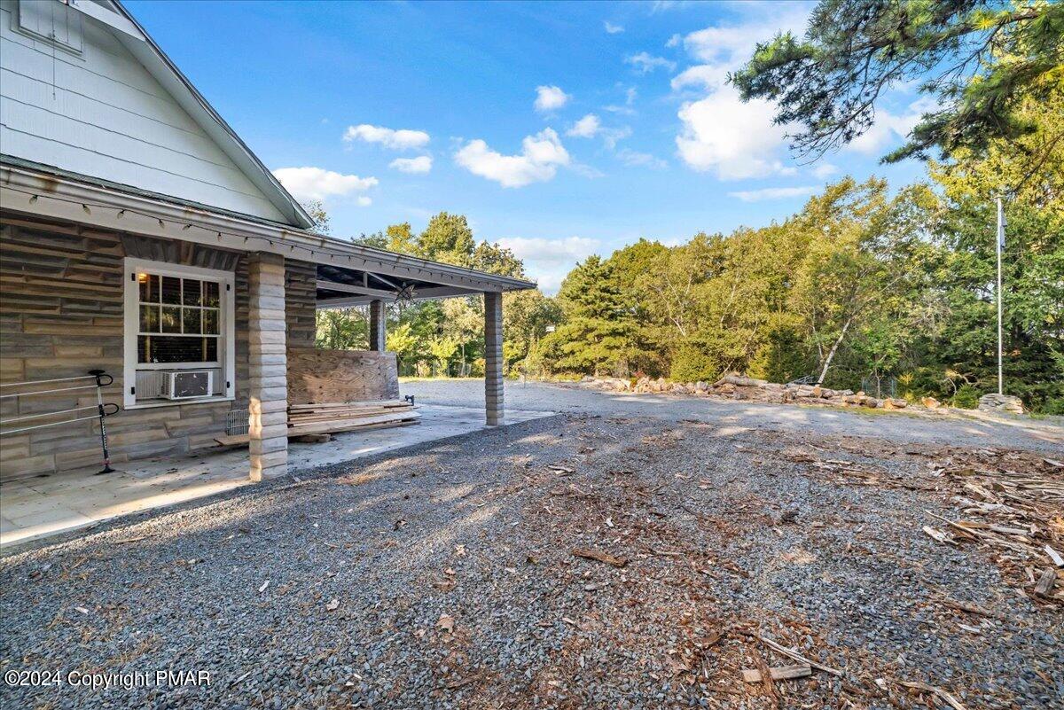 190 Knob Road Mount Pocono, PA 18344 - Photo 11 of 37 a view of a house with backyard and garden