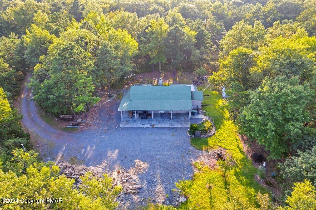 190 Knob Road Mount Pocono, PA 18344 - Photo 17 of 37 a view of a house with a yard and sitting area