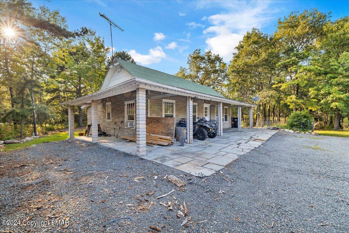 190 Knob Road Mount Pocono, PA 18344 - Photo 2 of 37 a view of a house with a yard and large tree