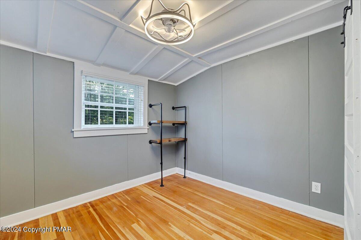 190 Knob Road Mount Pocono, PA 18344 - Photo 22 of 37 a view of a room with wooden floor and a window