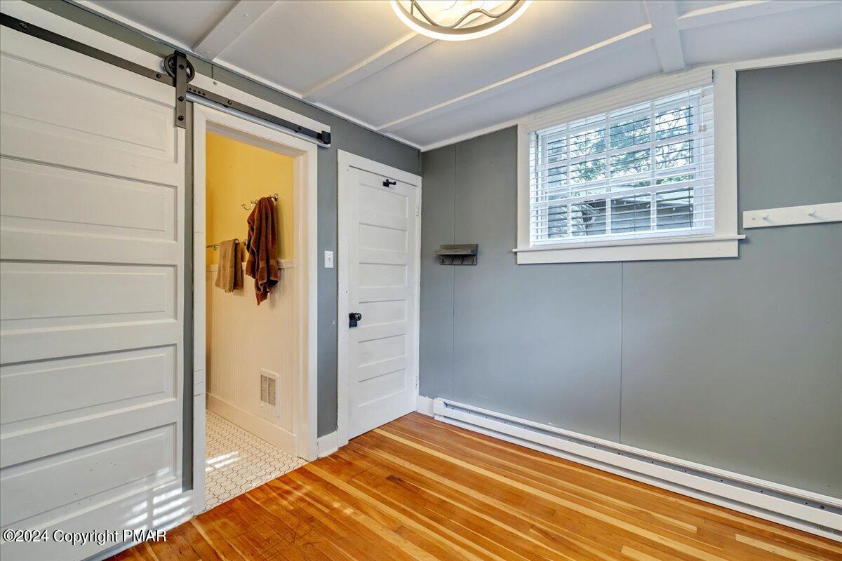 190 Knob Road Mount Pocono, PA 18344 - Photo 23 of 37 a bedroom with a bed and a window