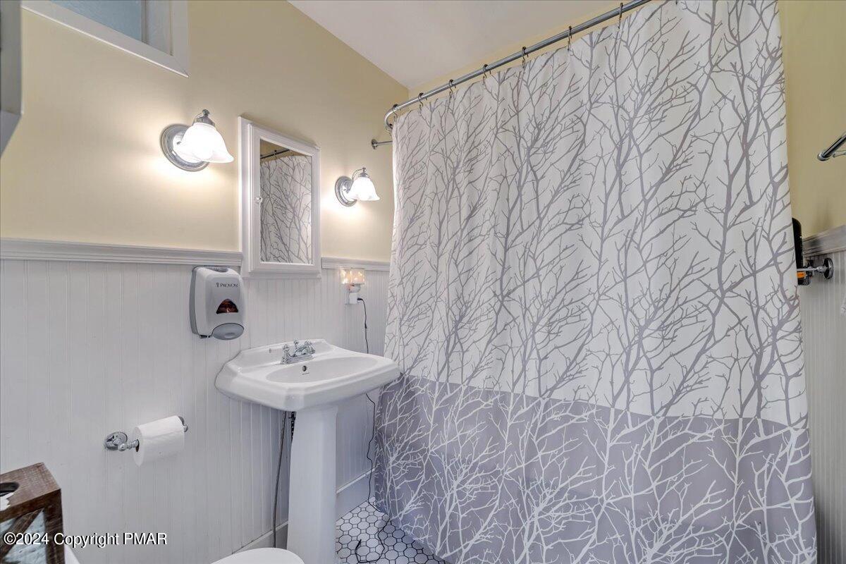 190 Knob Road Mount Pocono, PA 18344 - Photo 24 of 37 a bathroom with a sink and a mirror