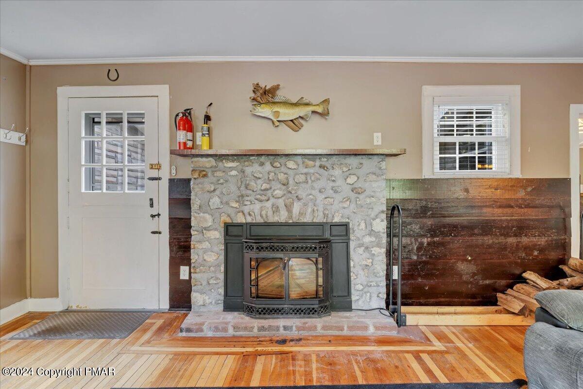 190 Knob Road Mount Pocono, PA 18344 - Photo 25 of 37 a living room with a fireplace and a fireplace