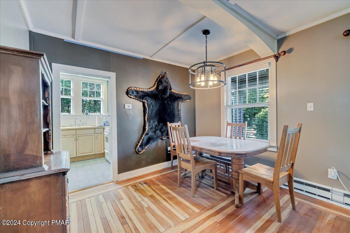 190 Knob Road Mount Pocono, PA 18344 - Photo 28 of 37 a view of a dining room with furniture window and wooden floor