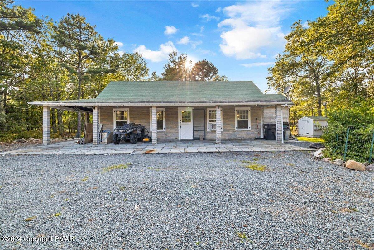190 Knob Road Mount Pocono, PA 18344 - Photo 3 of 37 a view of a house with a tub and a tree