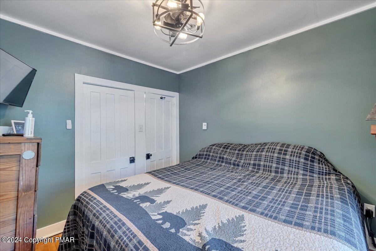 190 Knob Road Mount Pocono, PA 18344 - Photo 37 of 37 a bedroom with a bed and a window