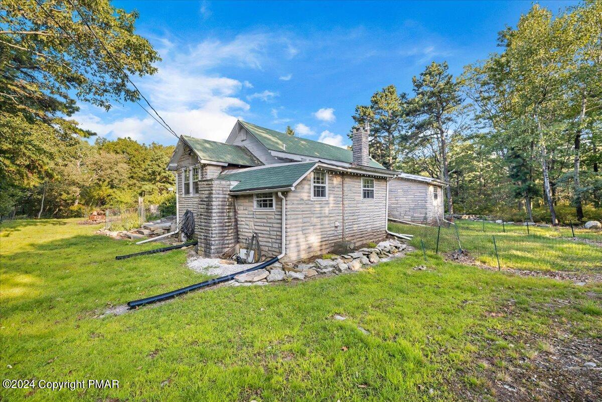 190 Knob Road Mount Pocono, PA 18344 - Photo 7 of 37 a view of a house with a yard