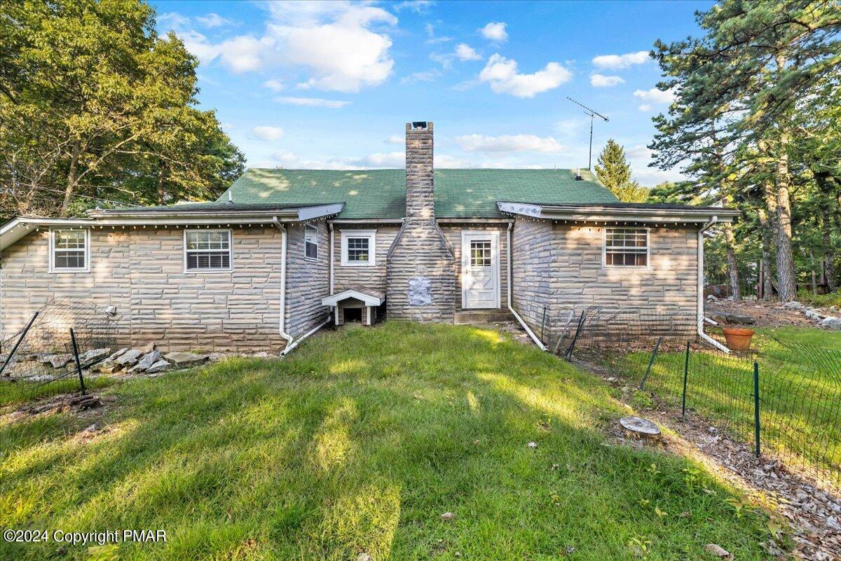 190 Knob Road Mount Pocono, PA 18344 - Photo 10 of 37 a front view of house with yard and green space