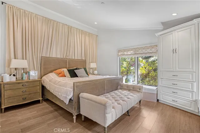 a bed room with a bed and a window