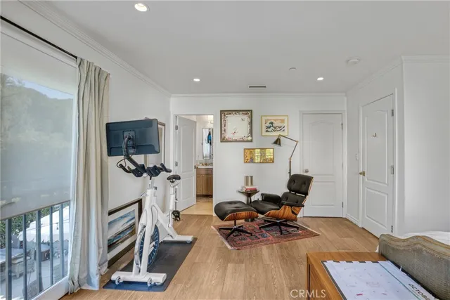 a view of a livingroom with furniture and a flat screen tv