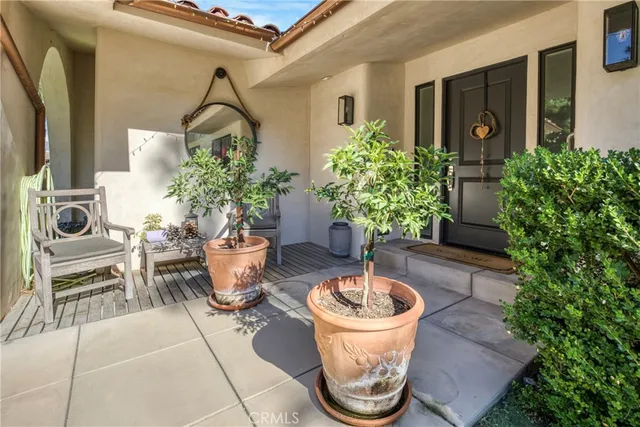 a view of a porch with seating space