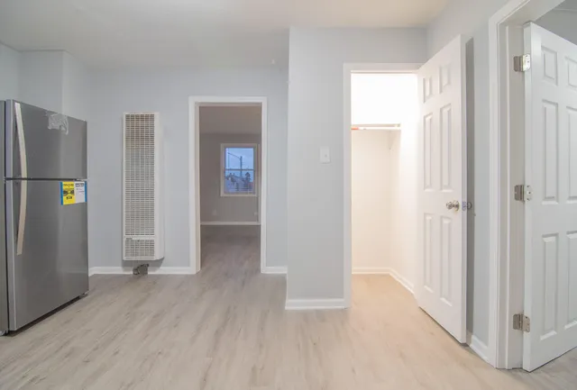 a kitchen with granite countertop a stove and a sink