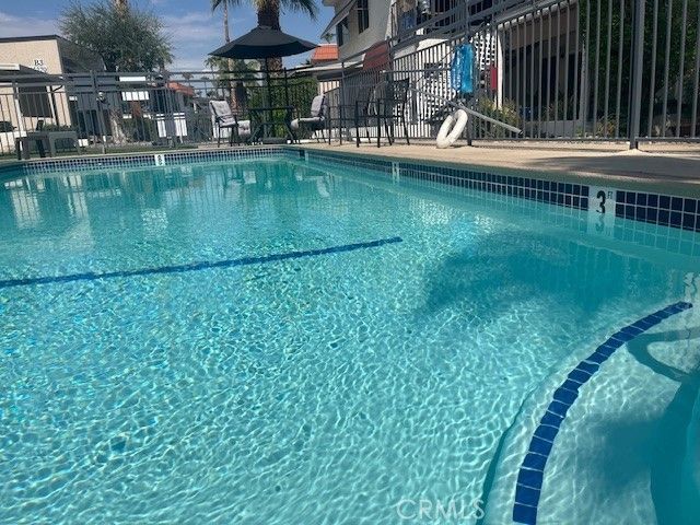 a view of a chairs and table in the patio