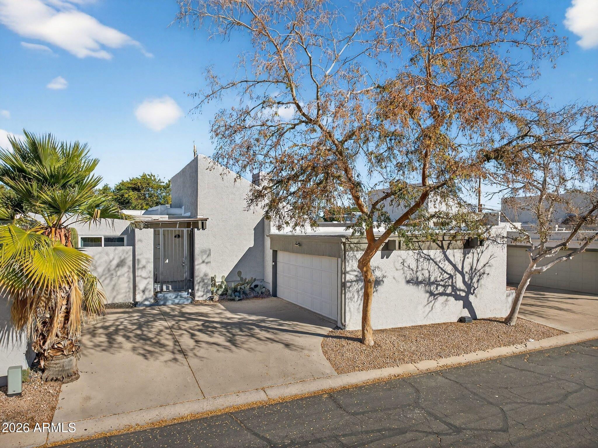 330 East Embassy Street Tempe, AZ 85288 - Photo 2 of 68 a view of a backyard of a house