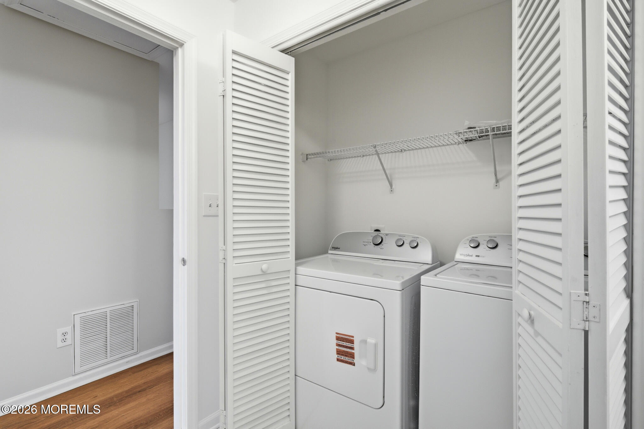 1606 Alpine Trail Neptune Township, NJ 07753 - Photo 16 of 33 a view of storage and utility room with washer and dryer