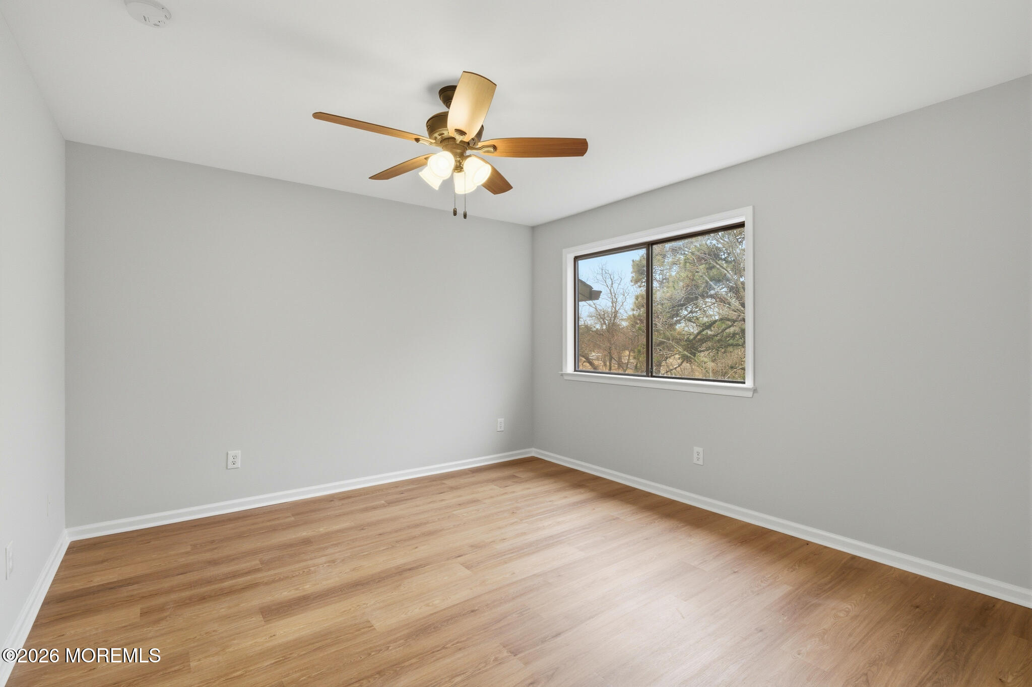 1606 Alpine Trail Neptune Township, NJ 07753 - Photo 18 of 33 wooden floor in an empty room with a window