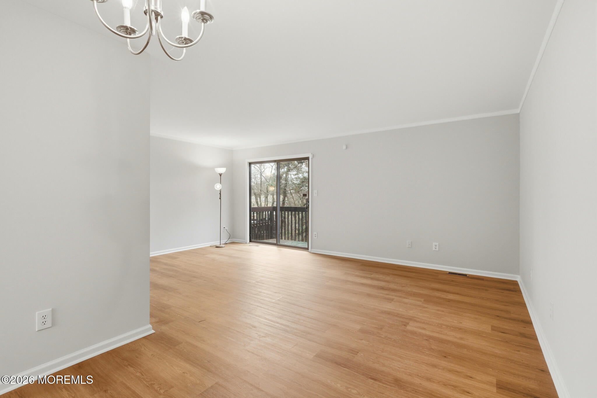 1606 Alpine Trail Neptune Township, NJ 07753 - Photo 27 of 33 a view of empty room with wooden floor