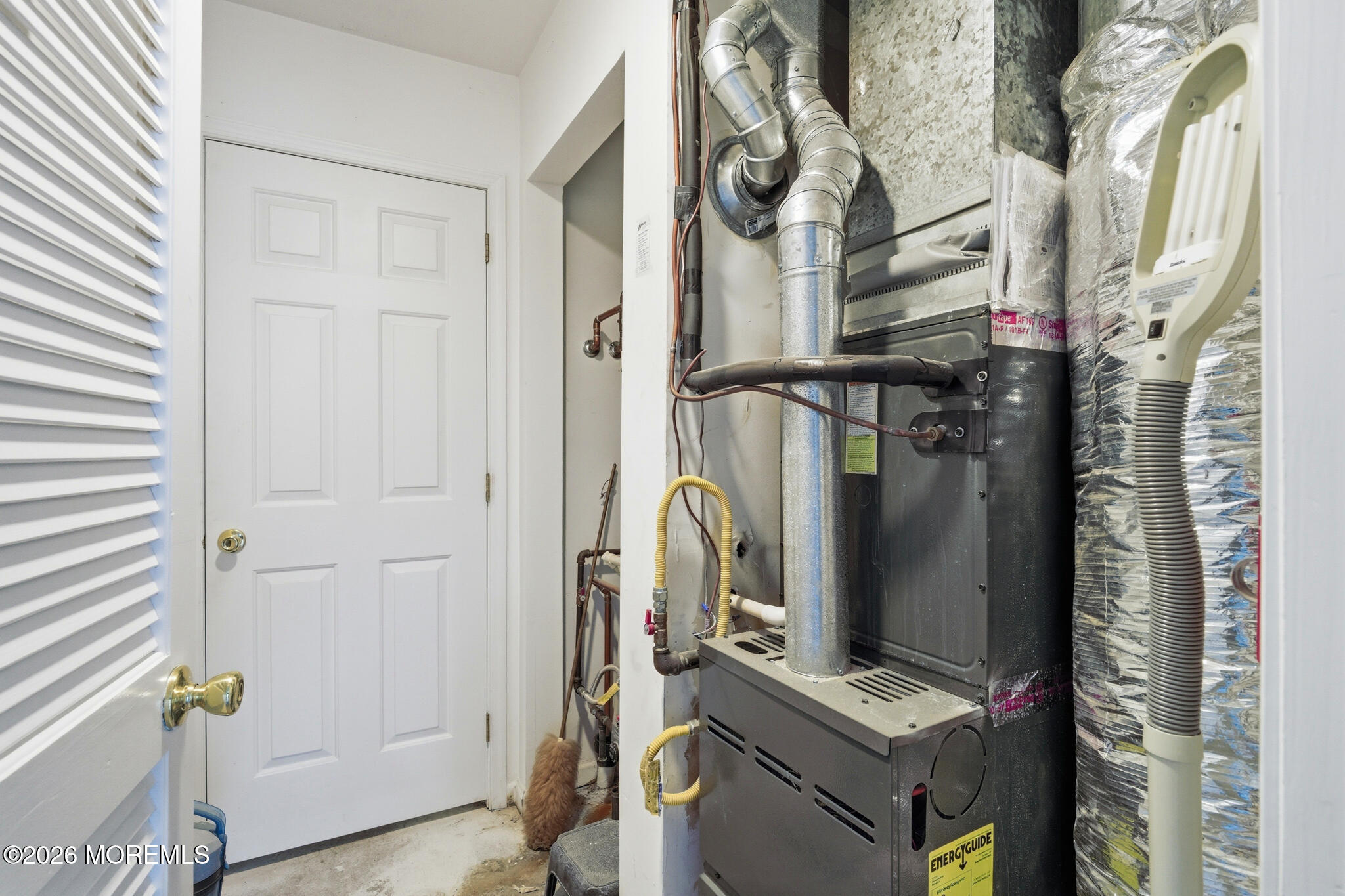 1606 Alpine Trail Neptune Township, NJ 07753 - Photo 30 of 33 a view of walk in closet with clothes and shoes