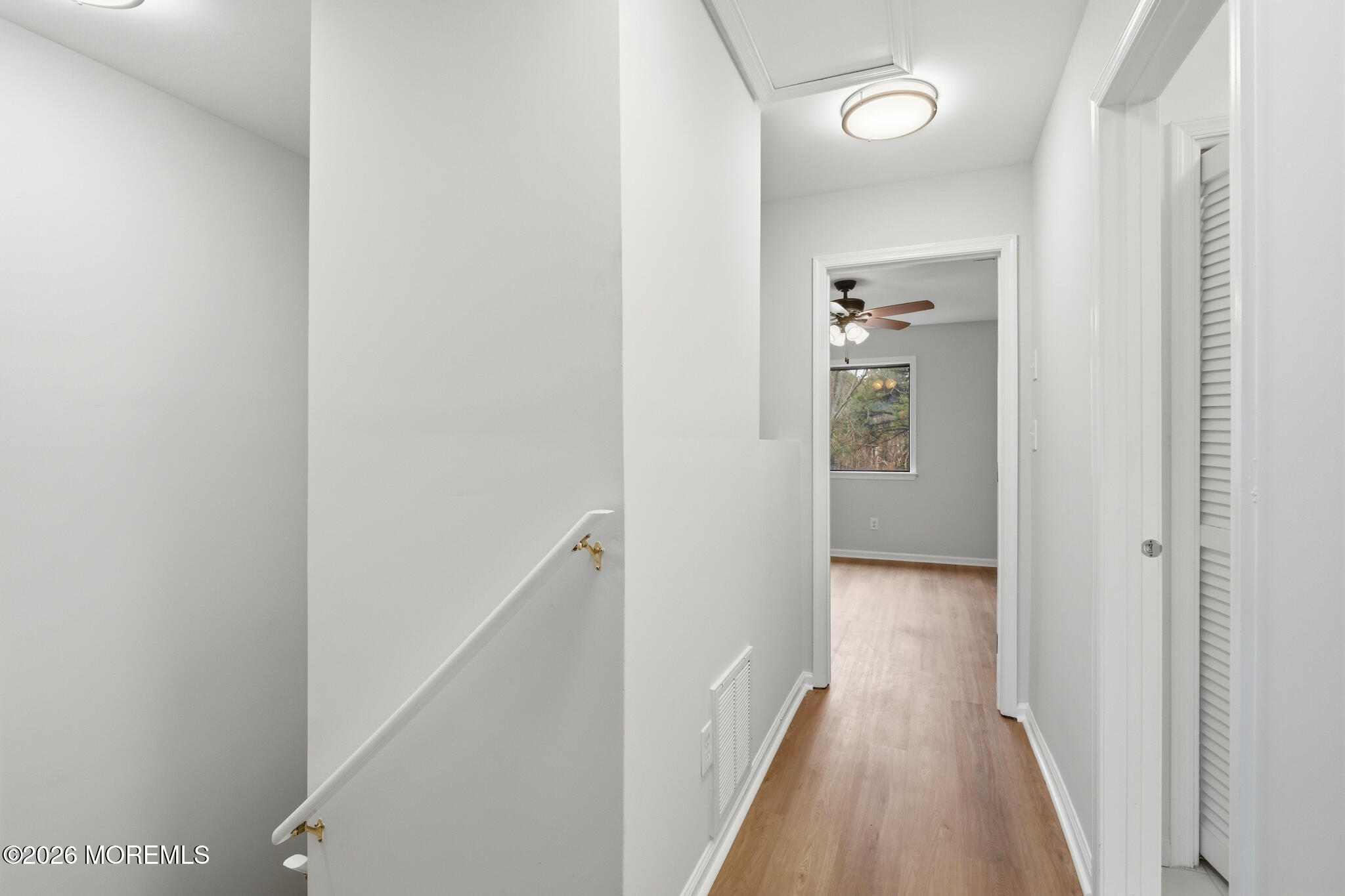 1606 Alpine Trail Neptune Township, NJ 07753 - Photo 32 of 33 a view of a hallway with a white walls