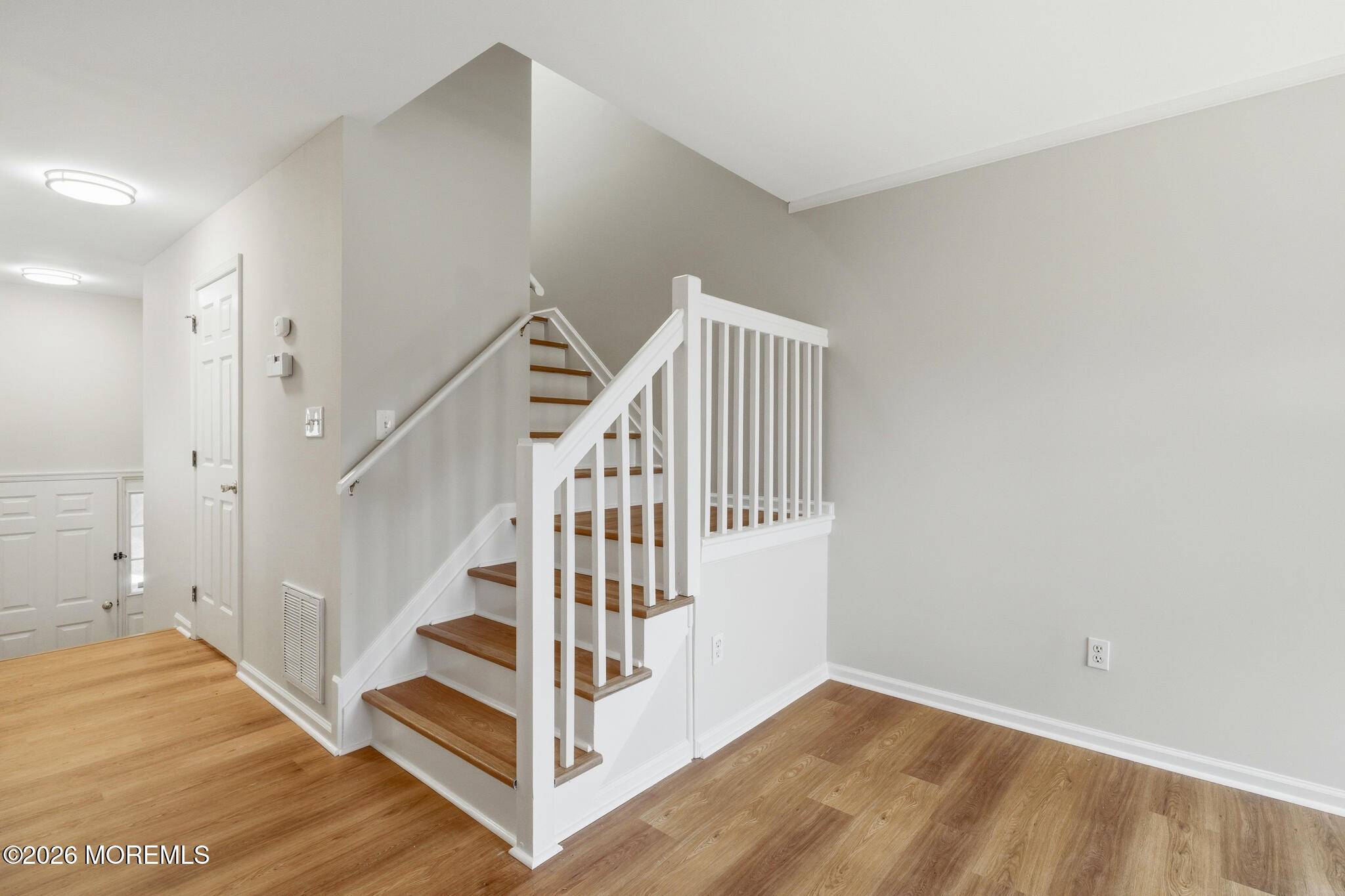 1606 Alpine Trail Neptune Township, NJ 07753 - Photo 5 of 33 a view of a hallway with staircase