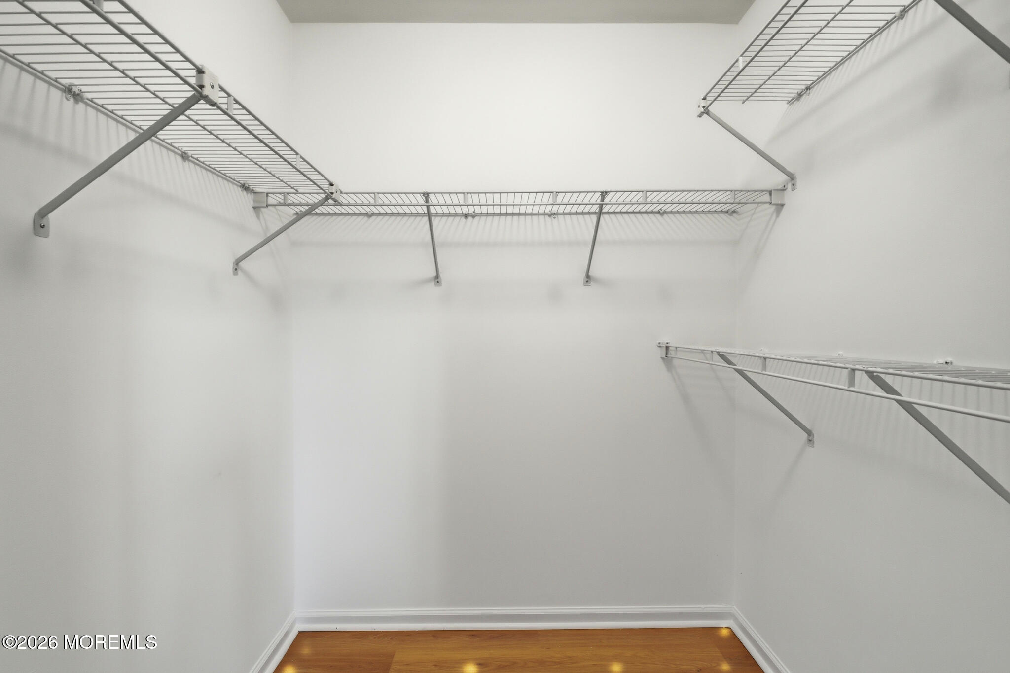 1606 Alpine Trail Neptune Township, NJ 07753 - Photo 10 of 33 a view of a room with racks on the wall